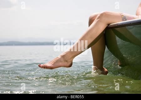 toples boat|Topless woman sunbathing on a boat Stock Photo .